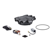 A black tune up kit laid out on a clean white background, including the main black coil base, a black ignition cover, a black ignition cable with a silver coil, a black gasket, a small metal screw, and a circular black rubber ring.