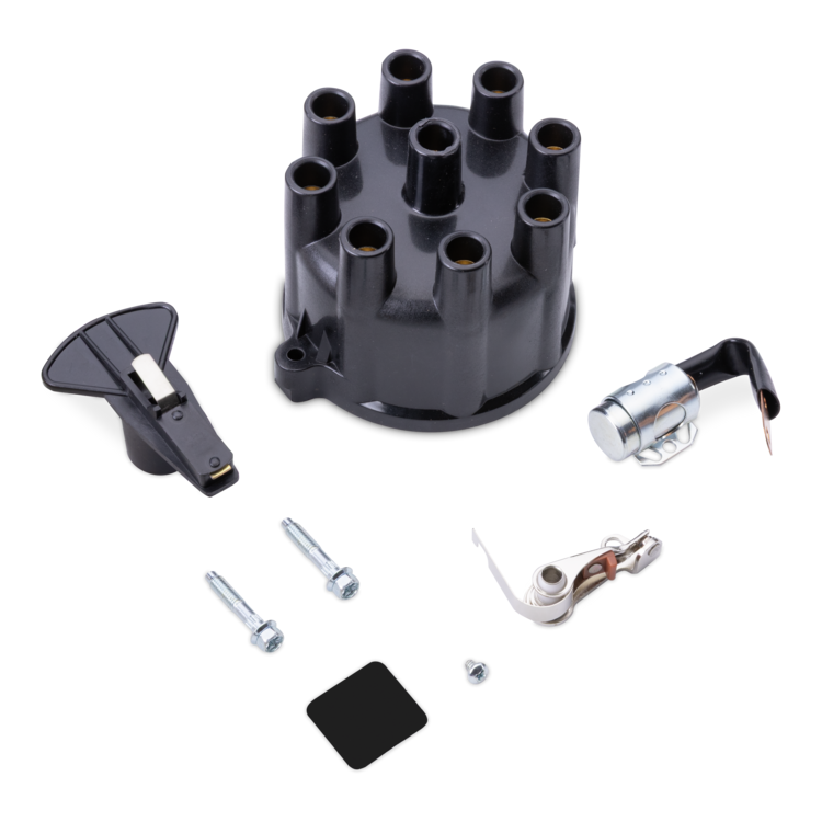 A black distributor cap kit with silver metal screws, bolts, and a small black rubber gasket, displayed on a clean white background.