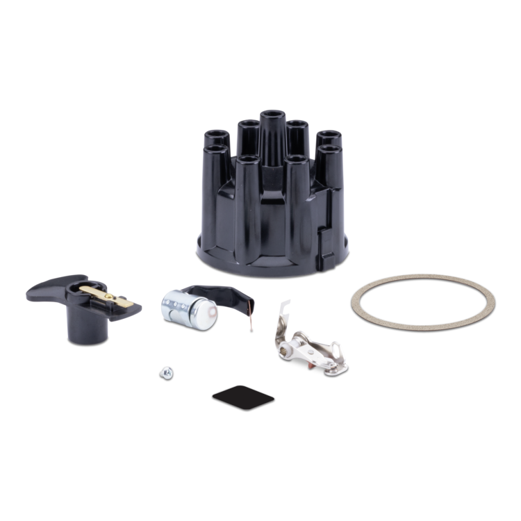 A black distributor cap kit with various metal and plastic mechanical parts, including a silver coil, silver ignition components, a small black square, a small silver screw, and a circular metal gasket, arranged on a clean white background.
