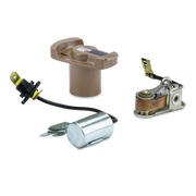 A set of three mechanical parts, including a tan plastic cap, a silver cylindrical metal cylinder with a black wire and key, and a copper-and-silver metal roller assembly, photographed on a plain white background.