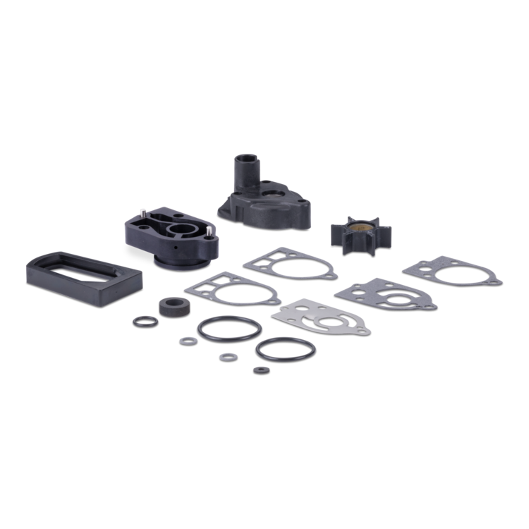 A set of black plastic and metal gasket components, including O-rings, flat gaskets, and molded housing parts, arranged on a plain white background.
