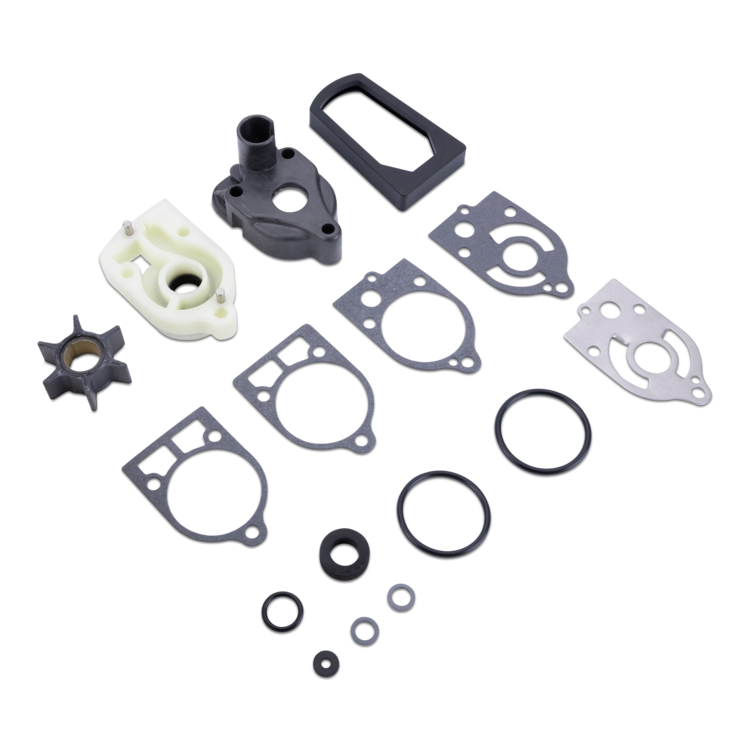 A complete water pump kit with various black rubber O-rings, flat gaskets, a white plastic component, and a black impeller, arranged neatly on a solid white background.