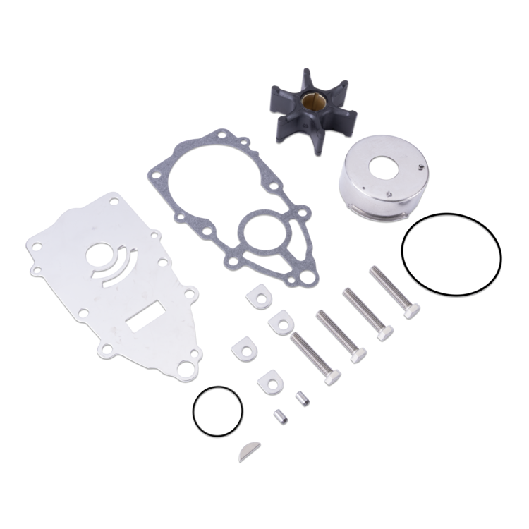 Engine gasket kit with various metal parts including a water pump, gaskets, O-rings, and screws arranged on a white background.