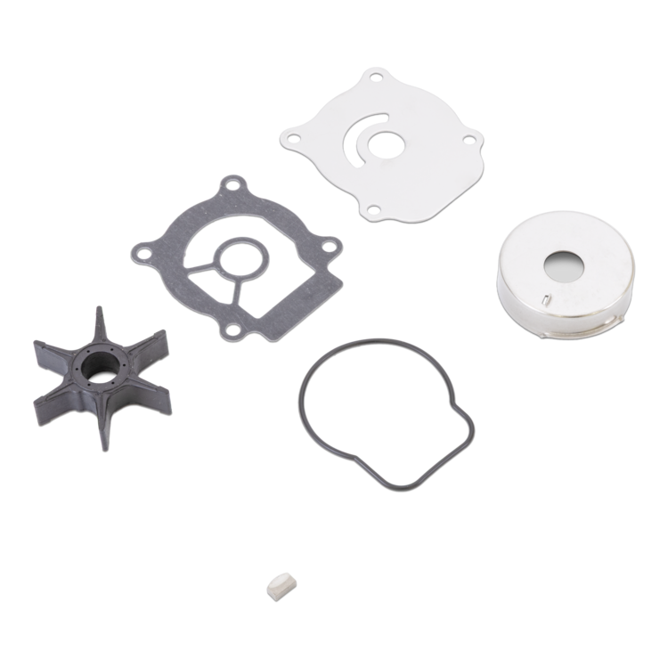 A set of small mechanical parts and gaskets laid out on a plain white background, including an impeller-like piece, a black gasket, a white round component, a thin black ring, and a small white cap.