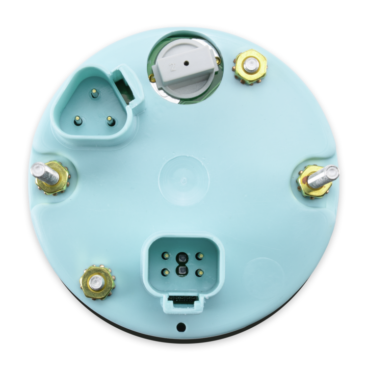 The underside of a circular speedometer housing, featuring a light blue plastic casing with various electrical connectors, terminal screws, and a central socket.