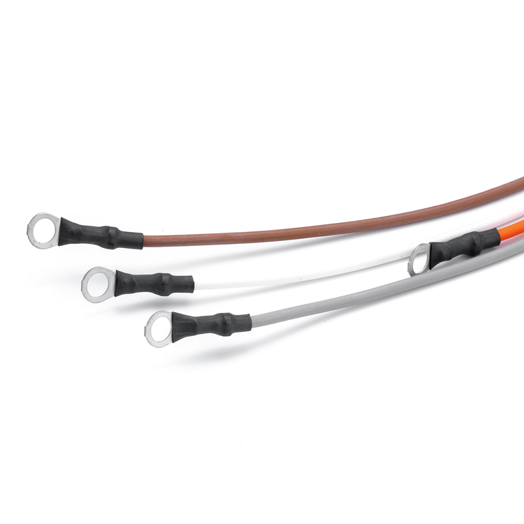 Three electrical cable leads with ring terminals, featuring a brown cable, a white cable, and an orange cable, each with a black sleeve and a silver ring terminal, shown on a white background.