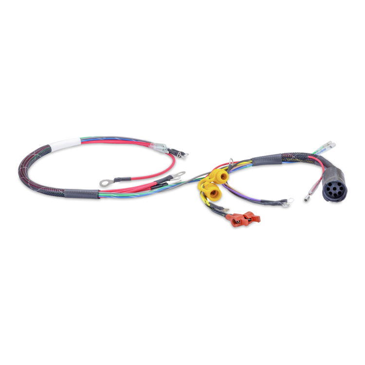An electrical wiring harness kit with multi-colored wires, terminal splices, yellow and red connectors, and a multi-pin plug, shown on a plain white background.