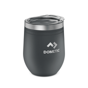 Gray insulated tumbler with silver lid on a white background, featuring the Dometic logo.