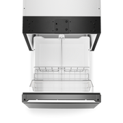 Top view of an open and empty Dometic NRXD pull-out style refrigerator