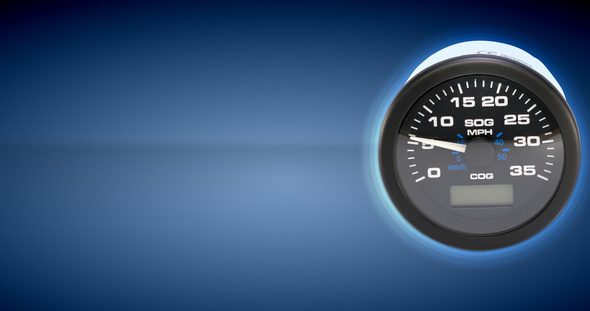 A black Sierra branded speedometer boat gauge against a black and blue background